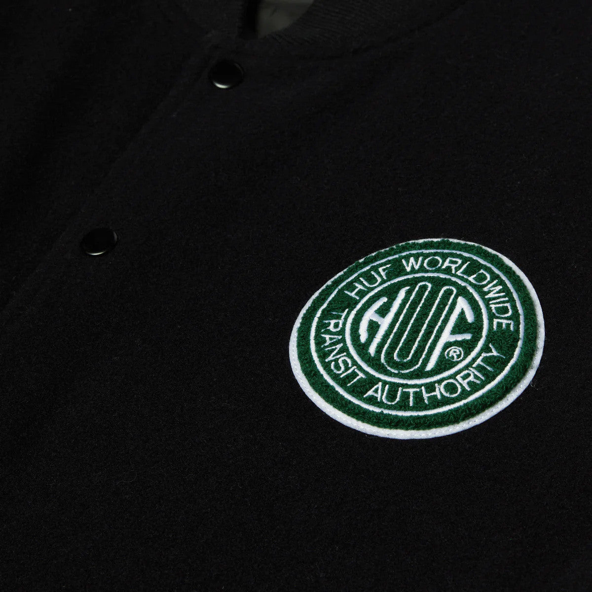 HUF GLOBAL TRANSIT VARSITY JACKET // NAVY. – Collateral