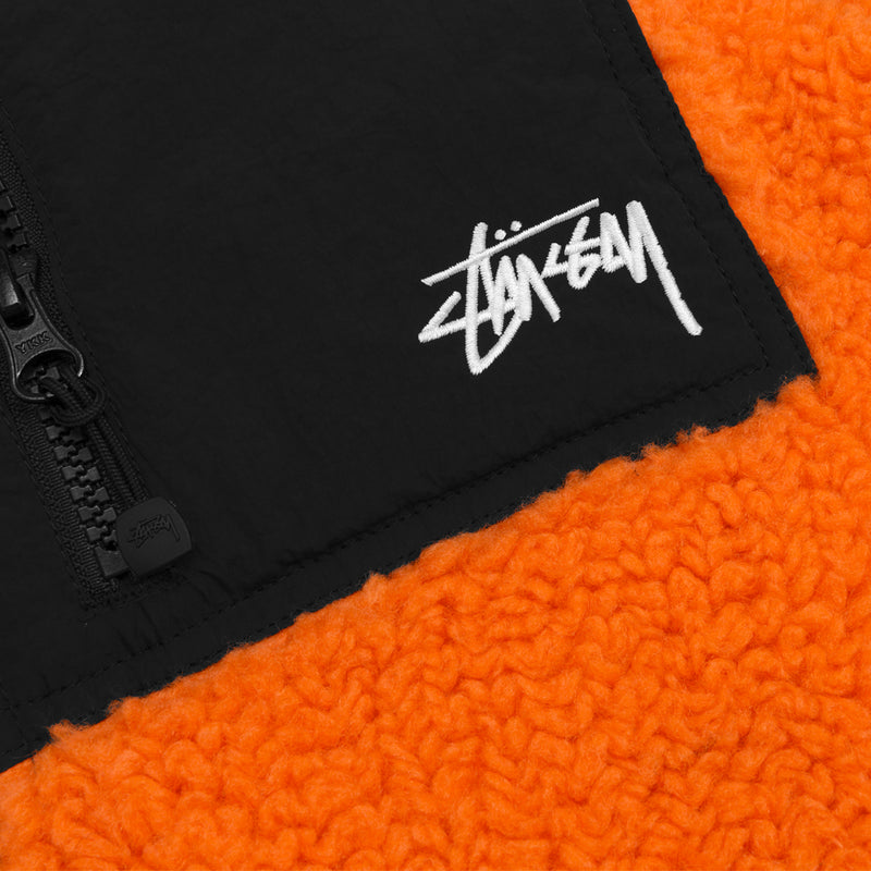 stussy 118528 sherpa reversible vest tangerine